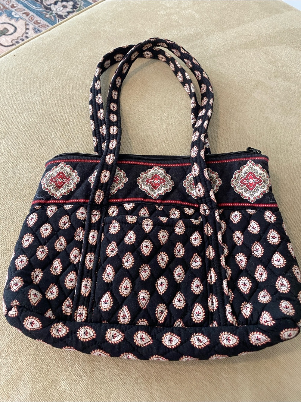 We are Bradley Quilted Black Patterned Tote Bag with Red Accent